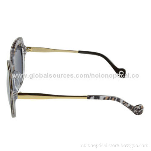 Oversize black tortoise sunglasses temple with hole deco